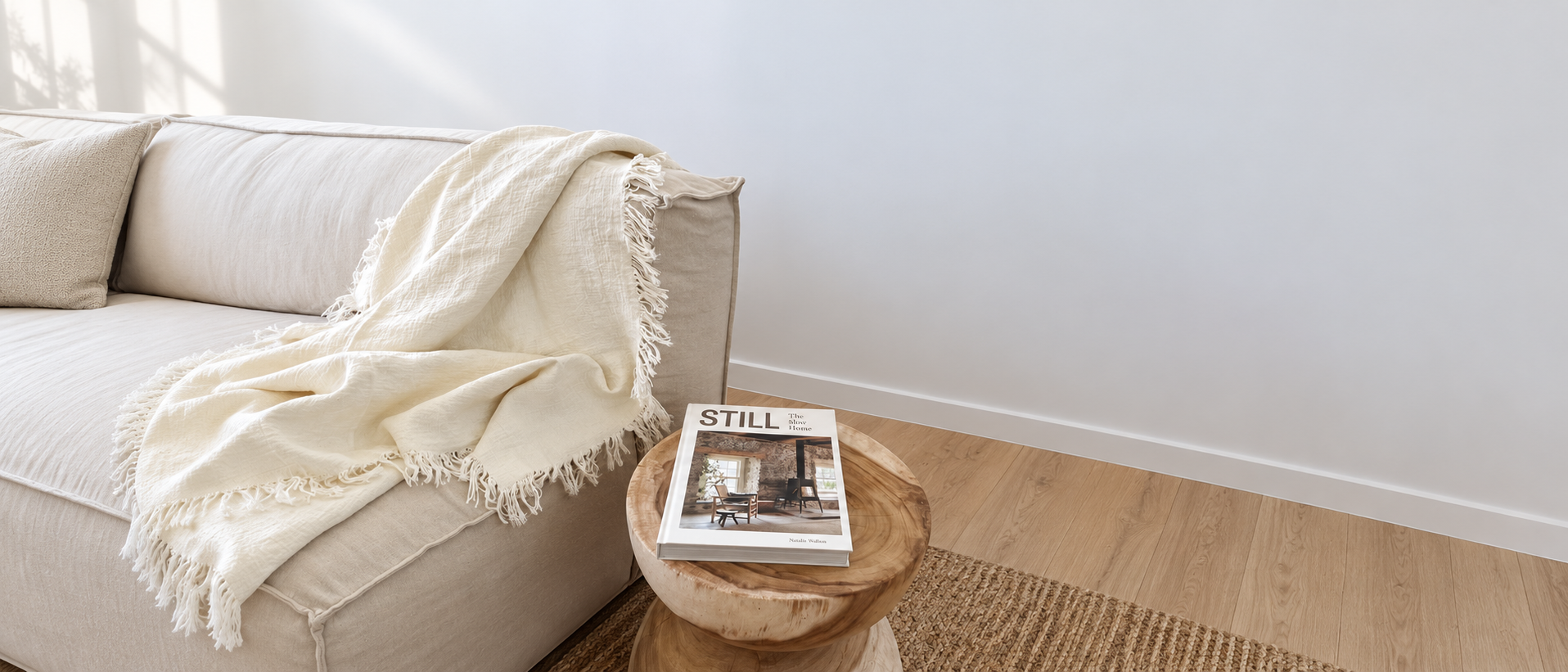 Soft forms and textiles arranged in a relaxed interior